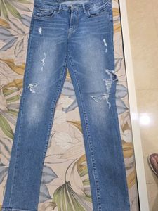 Distressed Blue Denim Jeans