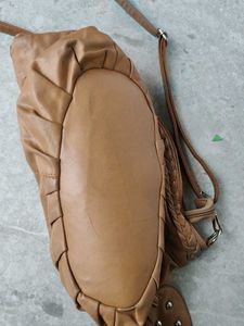 Chic Tan Leather Shoulder Bag with Flower Detail