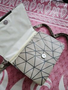 22.Stylish Geometric Crossbody Bag