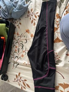 Black gym capri with Purple Stitching