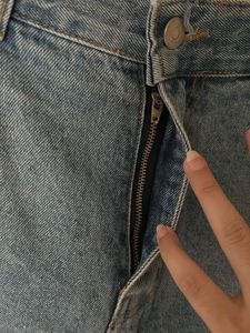 Distressed Blue Denim Jeans