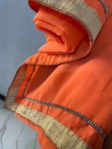 Elegant Orange Saree with Golden Border