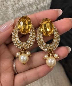 ✨ Golden Crystal Statement Earrings