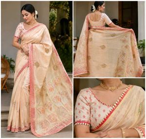 Elegant peach Silk Saree with Pink Border