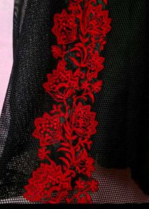 Elegant Black Lace Dress with Red Floral Detail