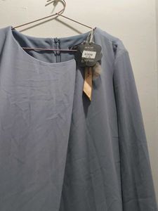 Brand new dress. still has tag and never worn. Kne