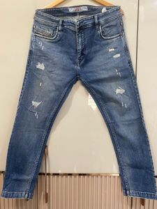 Distressed Denim Jeans