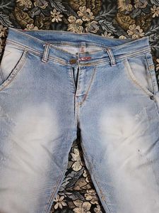 Light Wash Distressed Denim Jeans