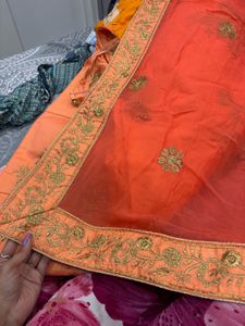 Stunning Orange Embroidered Lehenga Choli