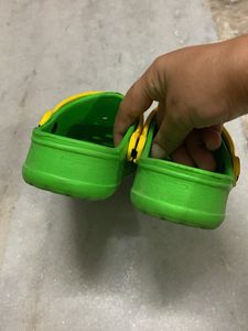 Green Crocs with Yellow Straps