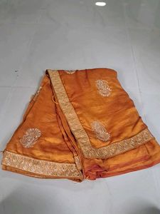 Elegant Orange Embroidered Saree