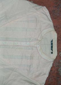 Light Peach Kurti with Delicate Embroidery