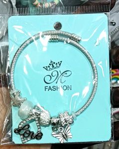 Charming Gold Tone Bangle Set with Charms