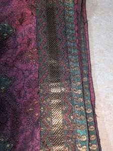 Elegant Purple Saree with Intricate Patterns