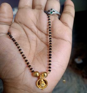 Elegant Gold Mangalsutra with Lord laxmi Pendant