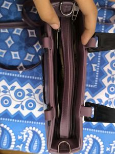 Chic Purple Handbag with Unique Handle