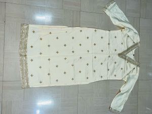 Embroidered Cream Silk Straight Kurta Pant Set.