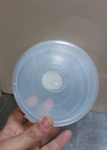 four Plastic Food Containers