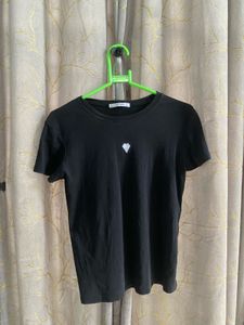 Black T-Shirt with White Heart Graphic