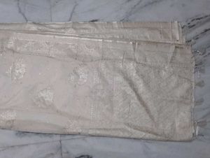 Elegant Off-White Embellished Saree