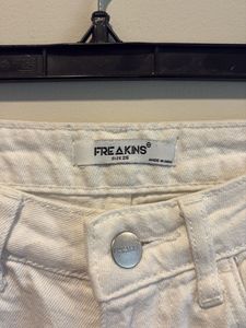 Cream Distressed Wide-Leg Jeans