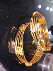 Elegant Gold Bangles with CZ Accents