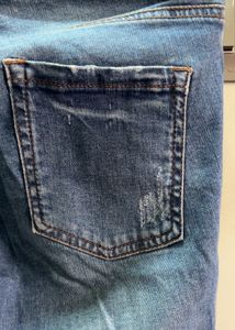 Distressed Blue Denim Jeans