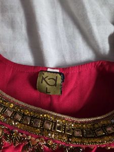 Vibrant Pink Art Silk aari work choli with contras