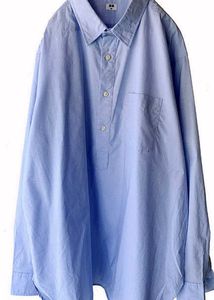 uniqlo light blue half button shirt