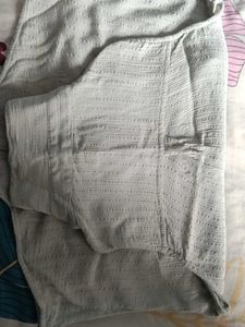 Light Blue Sleeveless Collared Shirt