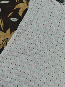Elegant White Saree with Red Motifs
