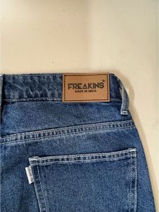 Distressed Blue Denim Jeans