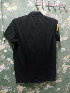 us polo l size black and peach colour T-shirt