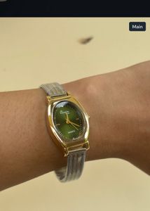 Elegant Gold Tone Green Dial Watch