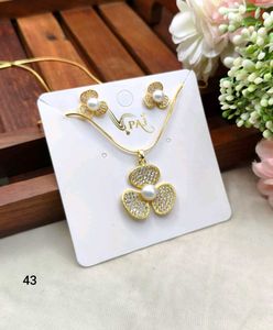 Elegant Flower Pendant & Earring Set