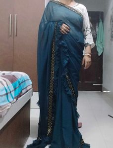 Elegant Teal Saree with Embellishments