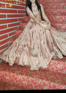 Elegant Peach Gown with Gold Print