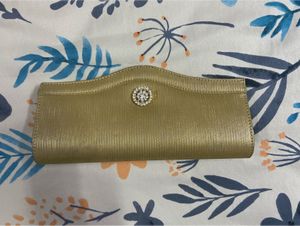 Elegant Gold Clutch with Embellishment