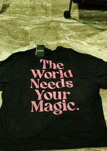 m size  Black "The World Needs Your Magic" T-