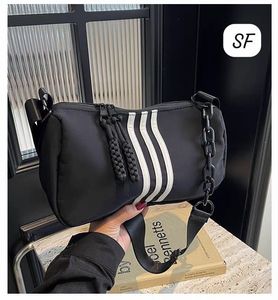 Sporty Black Crossbody Bag with White Stripes