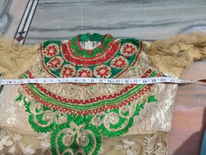 Elegant Cream Kurta with Red &amp; Green Embellishment