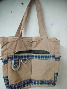 Stylish Tan Hobo Bag with Plaid Accents
