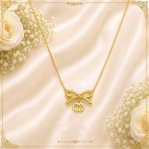 Gold Bow Pendant Necklace
