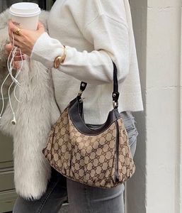 y2k vintage gucci inspired buckle saddle bag