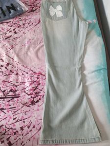 Light Wash Flare Jeans with Bow Detail