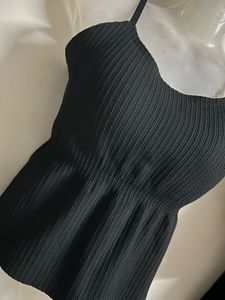 Chic Black Ribbed Peplum Top