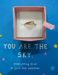 Elegant Gold Ring with Crystals