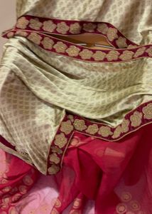 Elegant Cream and Red Saree with Gold Border