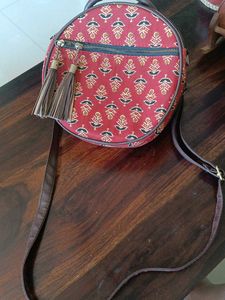 Round Sling Bag with Tassels