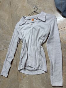 white collered full sleeve workout top